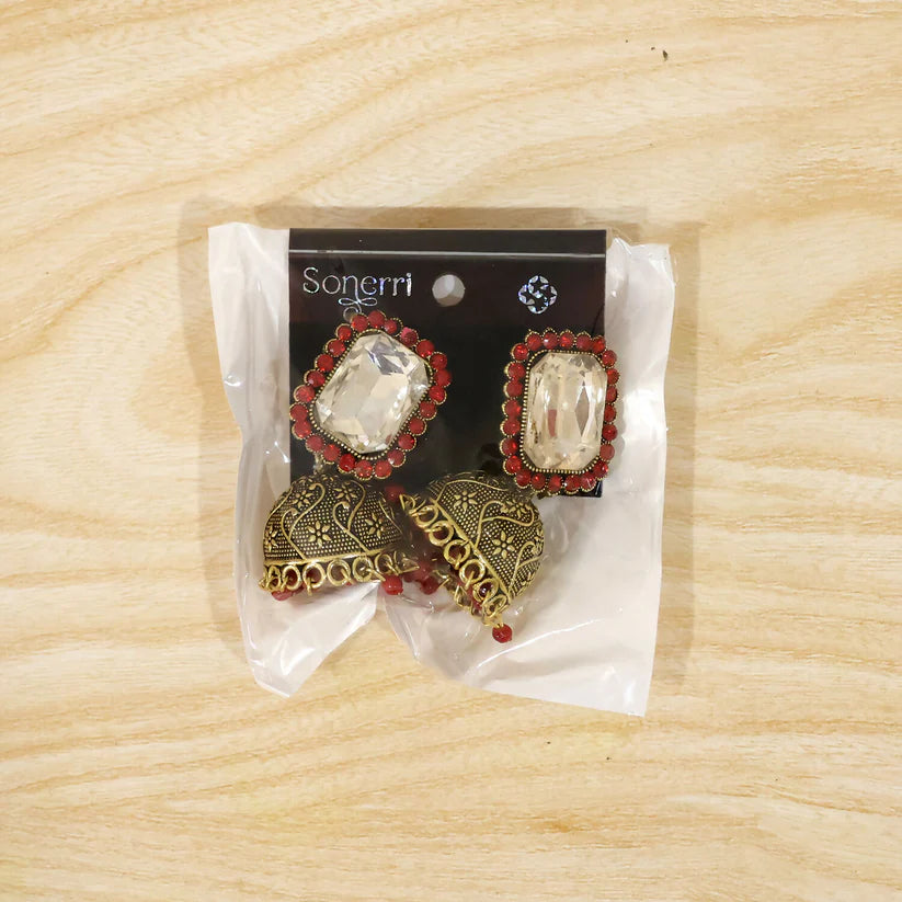 Red stone antique gold jhumka earrings with clear center stud design